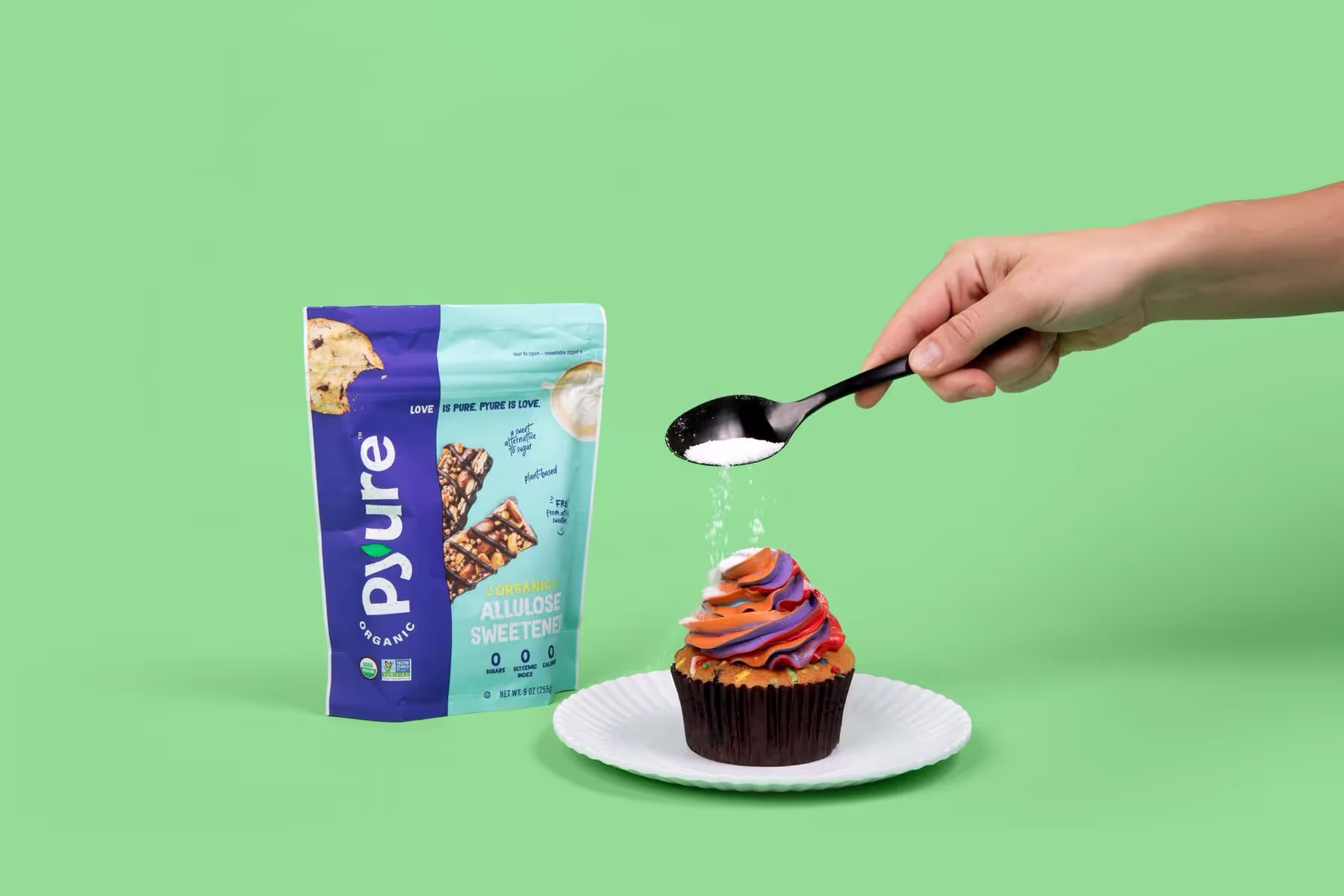 a cupcake on a green backdrop